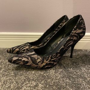 Black lace overlay pumps